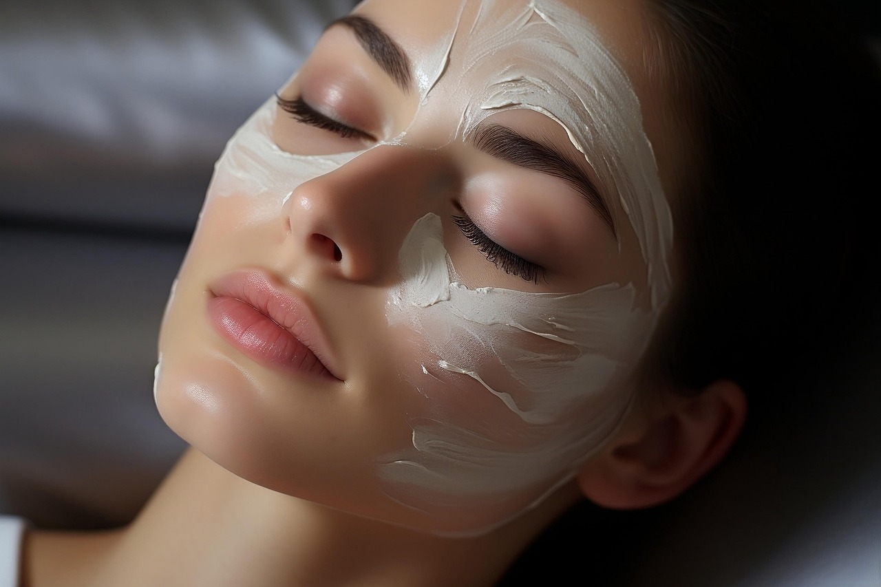 Client relaxing during a facial treatment